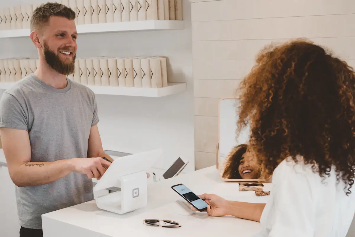 Customer completing a mobile payment at an online store checkout
